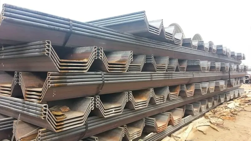 %[alt engineer calculating pile weight with calculator and drawings](https://placehold.co/600x400 "Pile Weight Calculation")